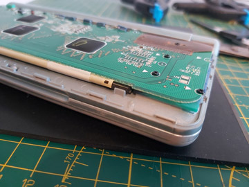 Photo of a the rubber strip installed inside the fold of the flat flex cable